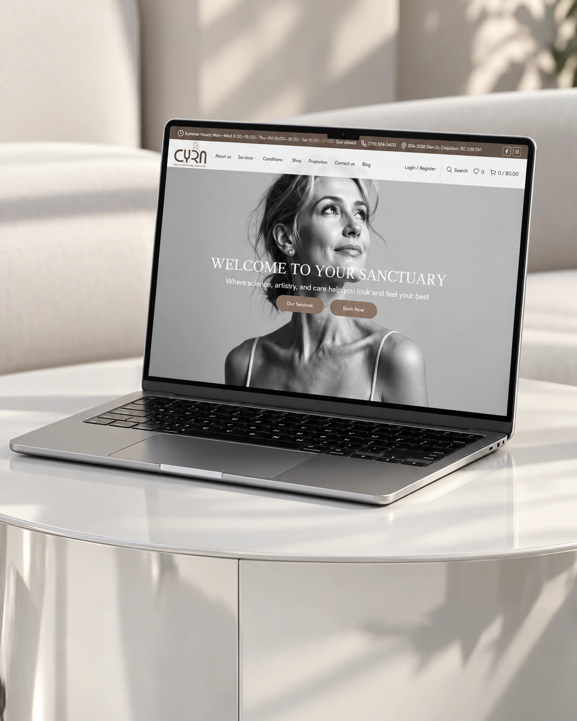 Cyra Beauty homepage on a laptop, on a white table: Welcome to your sanctuary hero