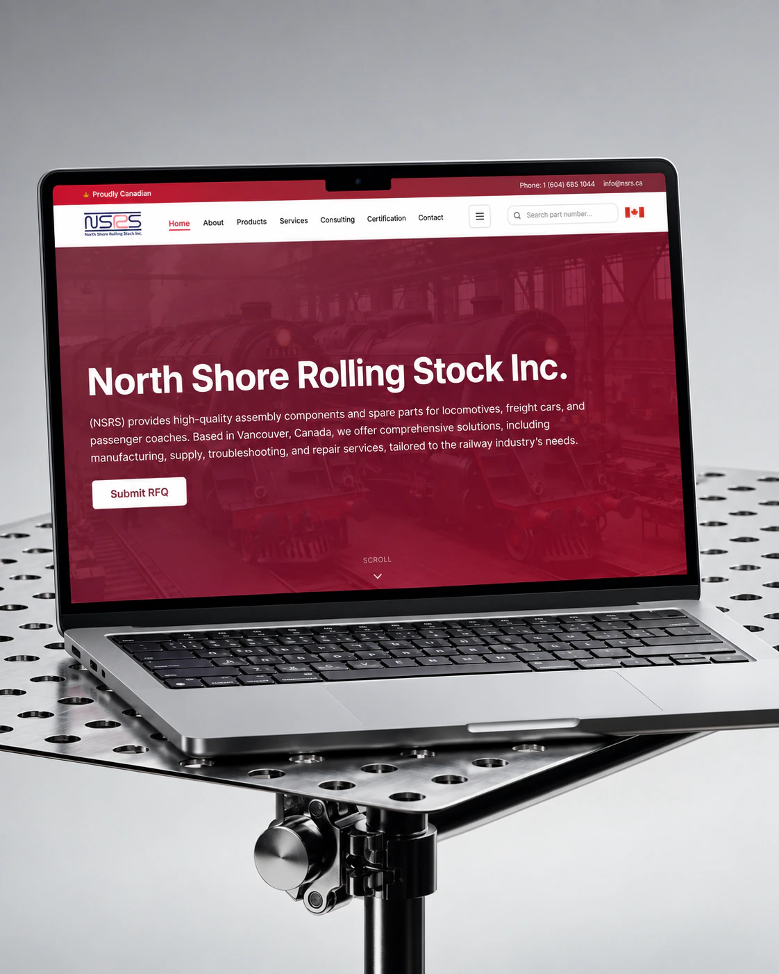 NSRS North Shore Rolling Stock homepage on a laptop, on a perforated steel stand