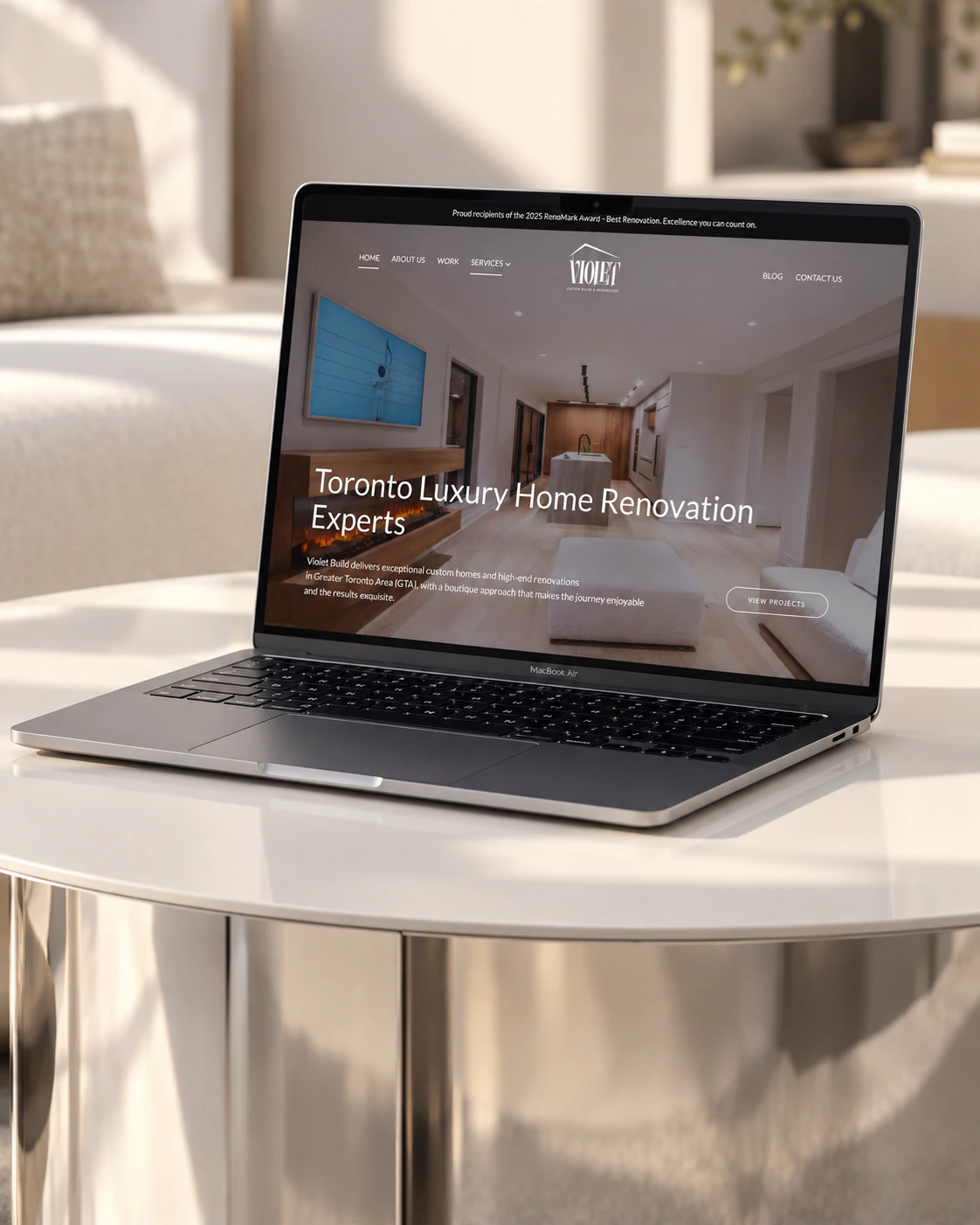 Violet Build homepage on a laptop: Toronto luxury home renovation experts hero